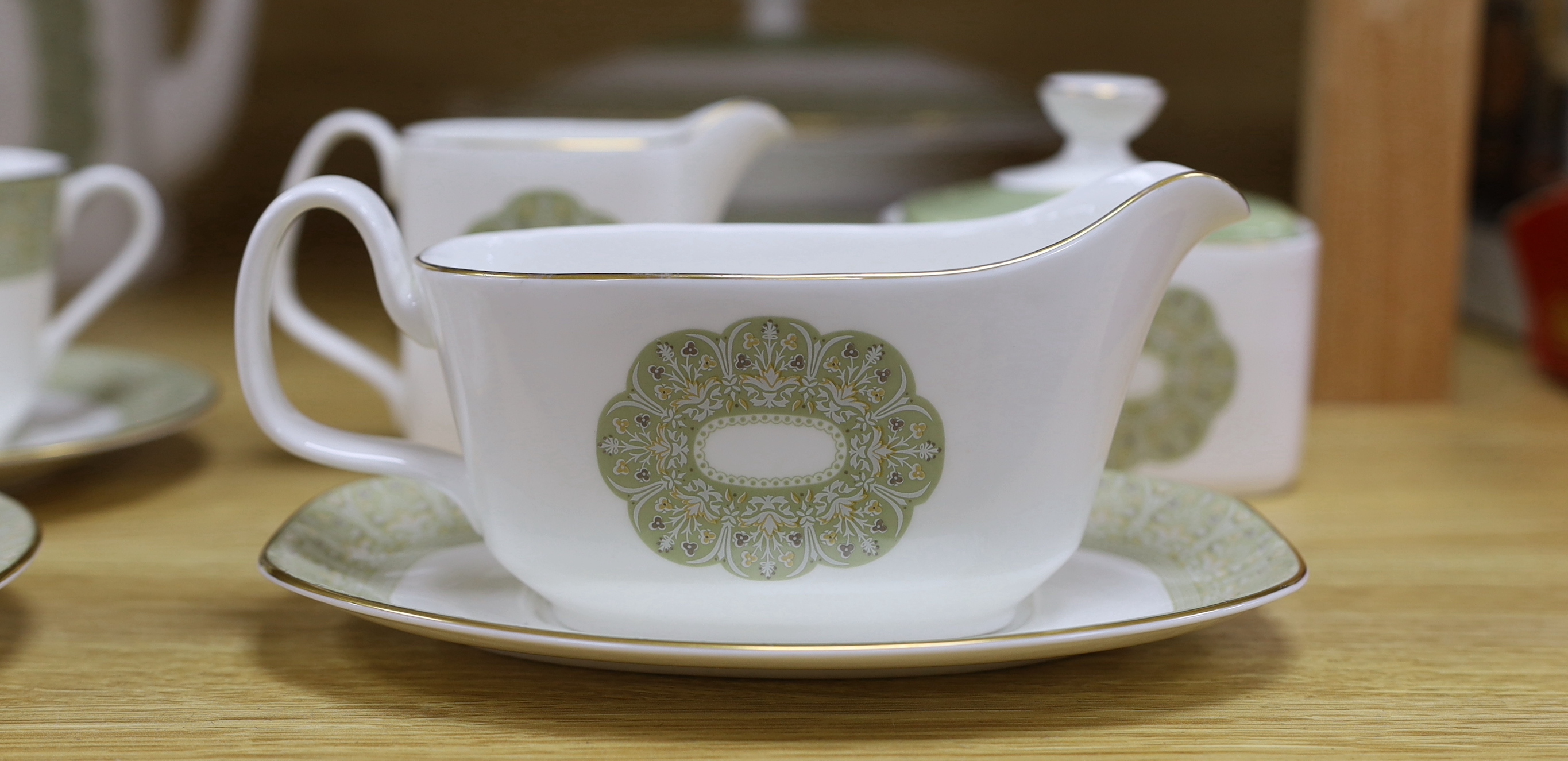 A Royal Doulton bone china dinner and tea service, Sonnet pattern